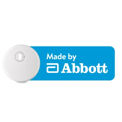 Round Instinct CGM sensor with manufacturer Abbott's logo