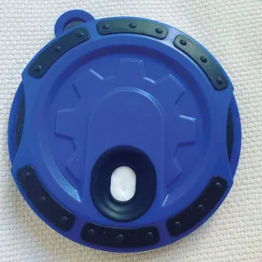A circular blue tool with a black border