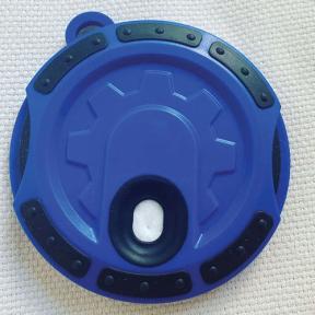 A circular blue tool with a black border