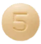 Photograph of a round, light orange pill with the number 5 embossed.