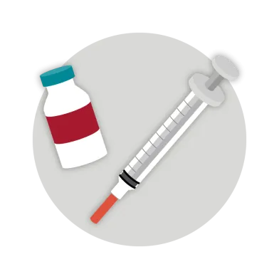 vaccine vial and syringe on grey circle
