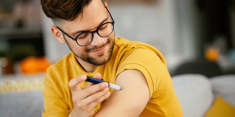 young-man-injecting-medication