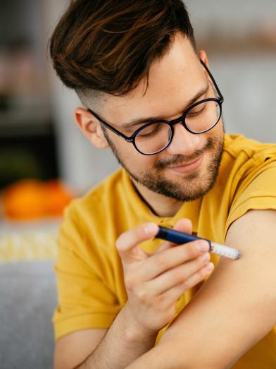 young-man-injecting-medication